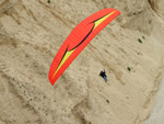  Red Lambada flying along the cliffs in Netanya